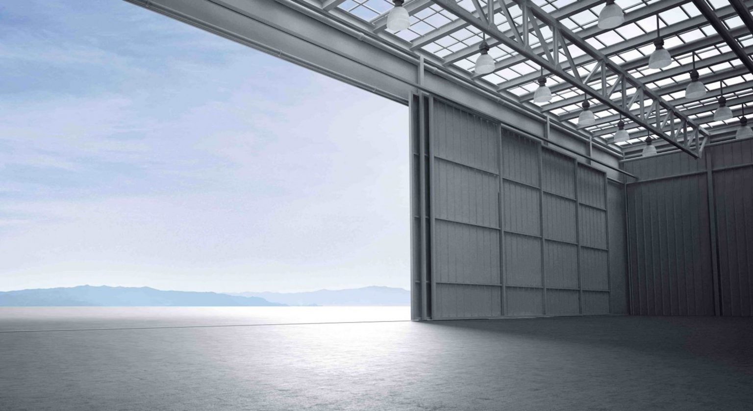 Heavy duty industrial sliding door systems